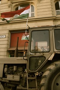 a tractor on the busy streets of Budapest joins in the march